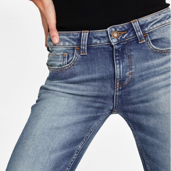 JEANS WITH UNEVEN HEMS AND PEARL BEADS - Picture 2 of 8